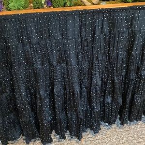 3 yards of black satin with silver/rainbow sequins table skirting